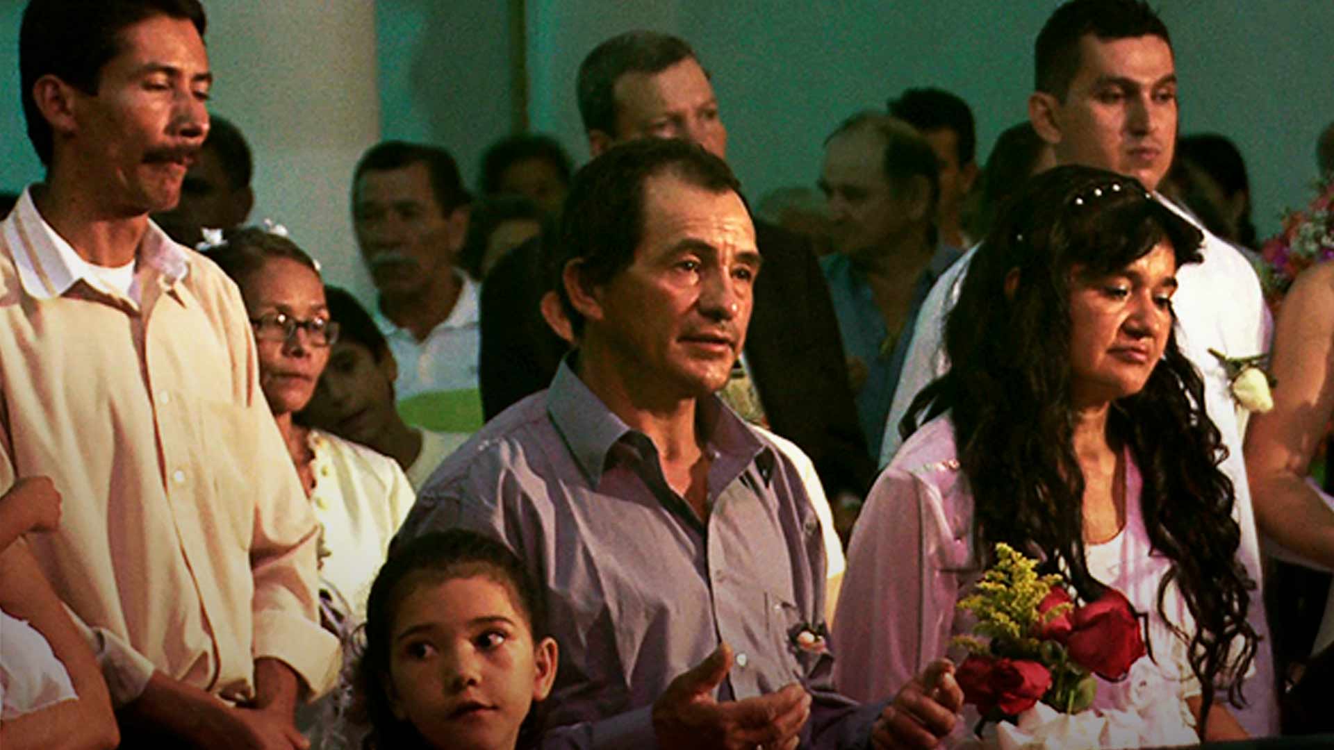 personas en la ceremonia de un matrimonio