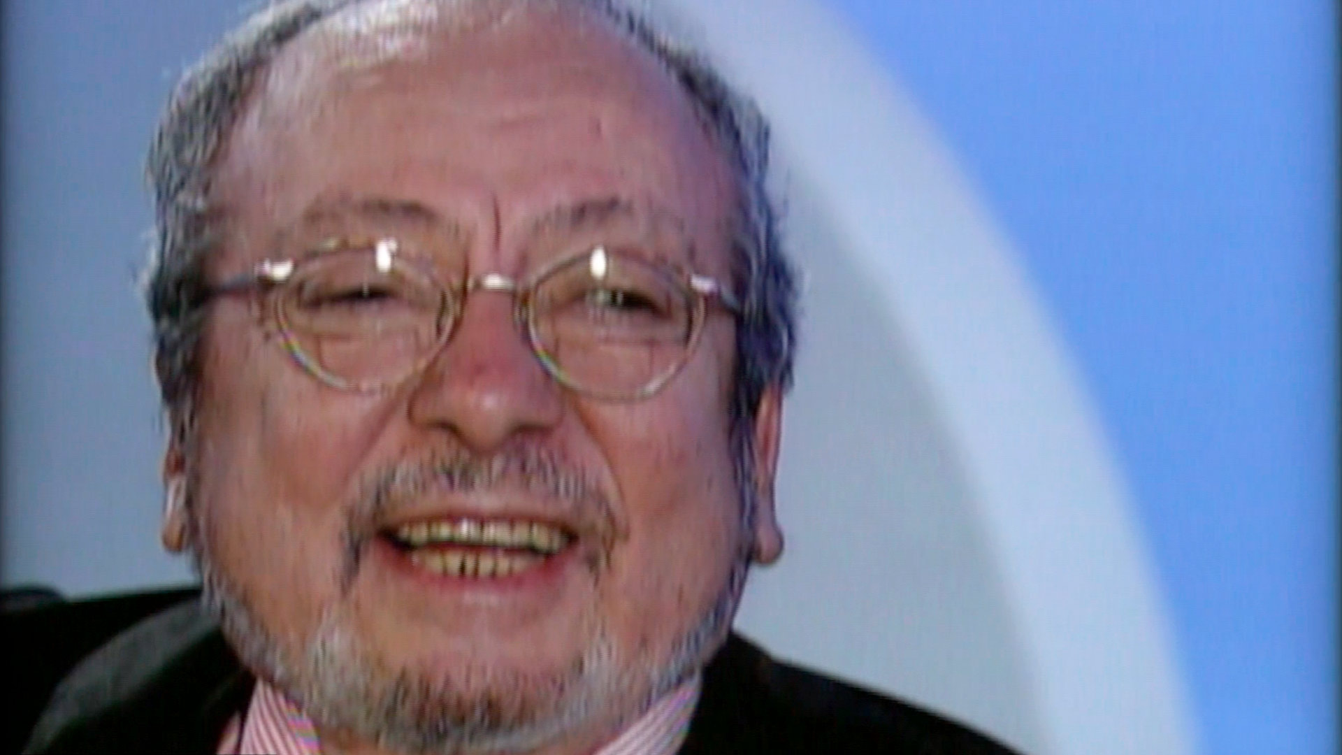 Enrque Grau riéndose