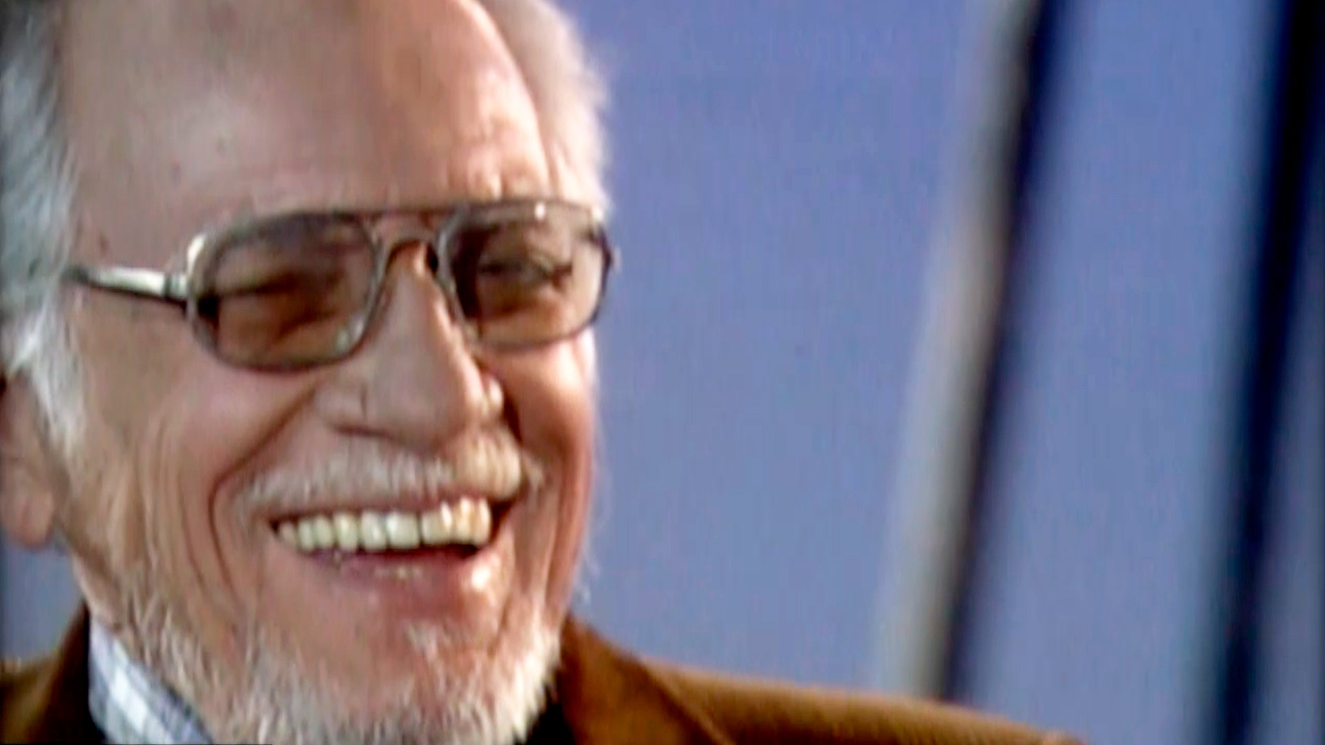 Nereo López, riendo 