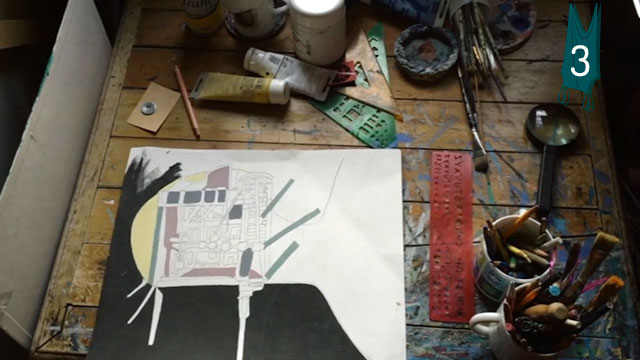 Mesa de dibujo con elementos para pintar