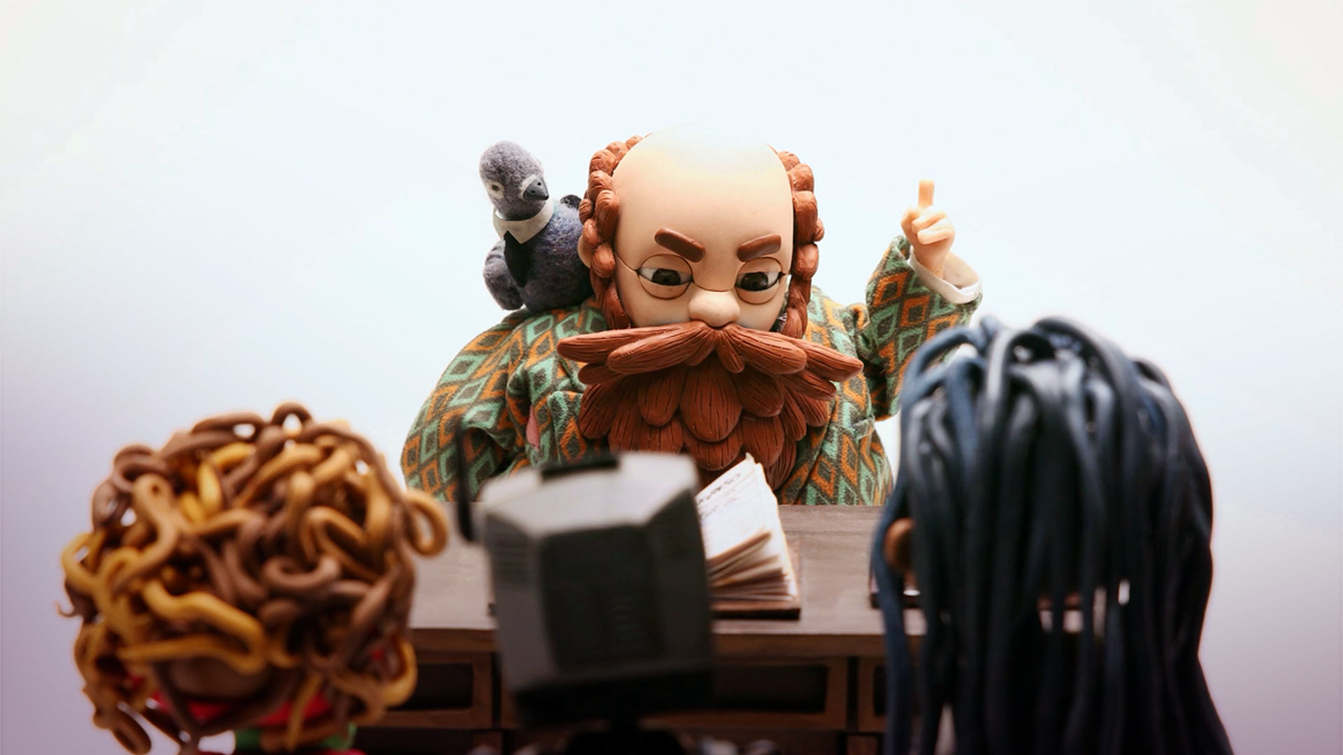 Un hombre barbado y dos niñas escuchándolo, Zander, ver Zander gratis, series infantiles gratis, series online, series gratis, series animadas