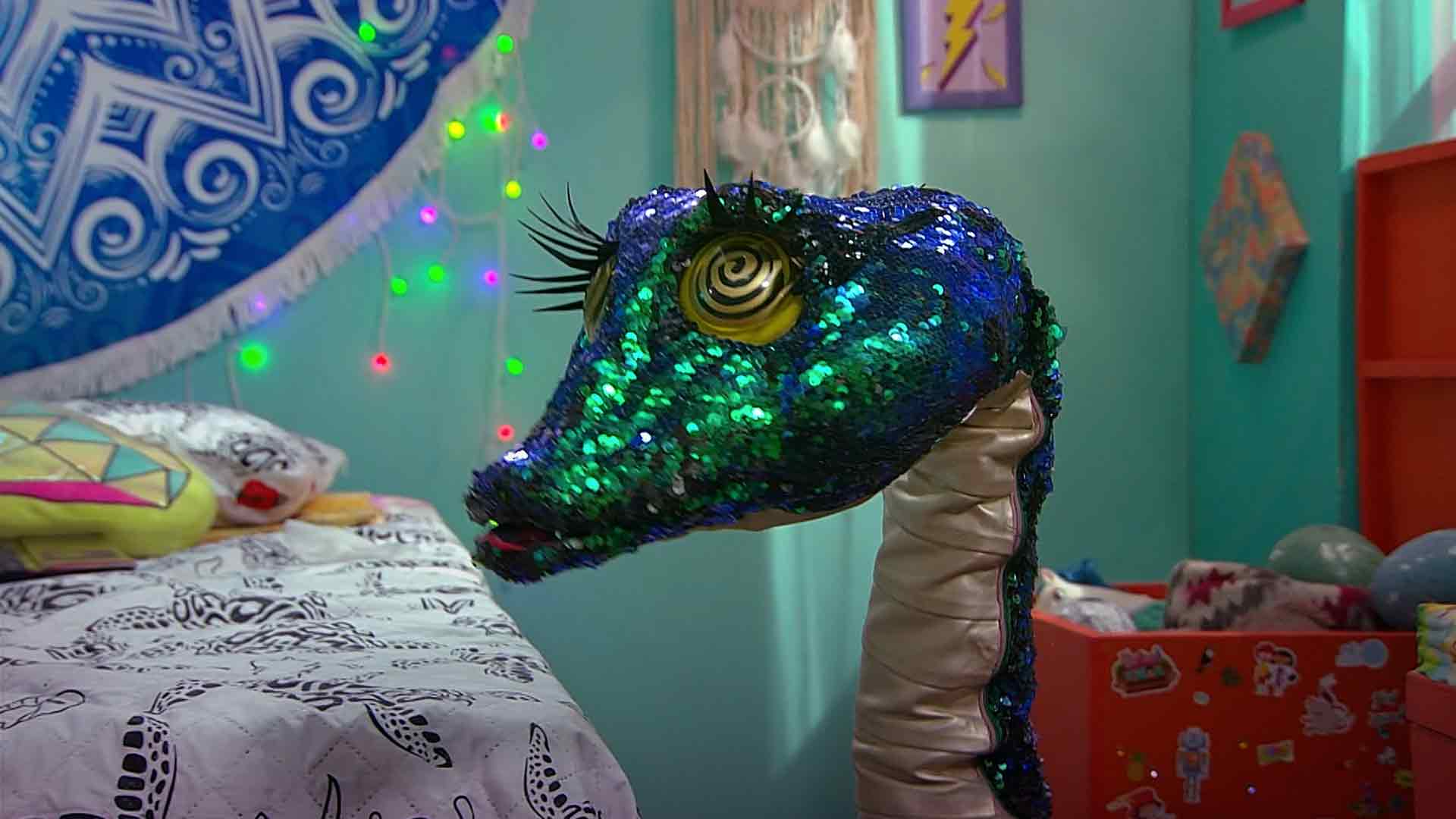 serpiente de lentejuelas con ojitos mareados