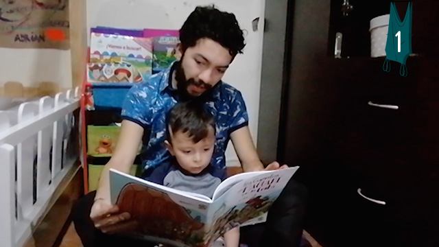 Tío y sobrino leyendo un cuento en su habitación