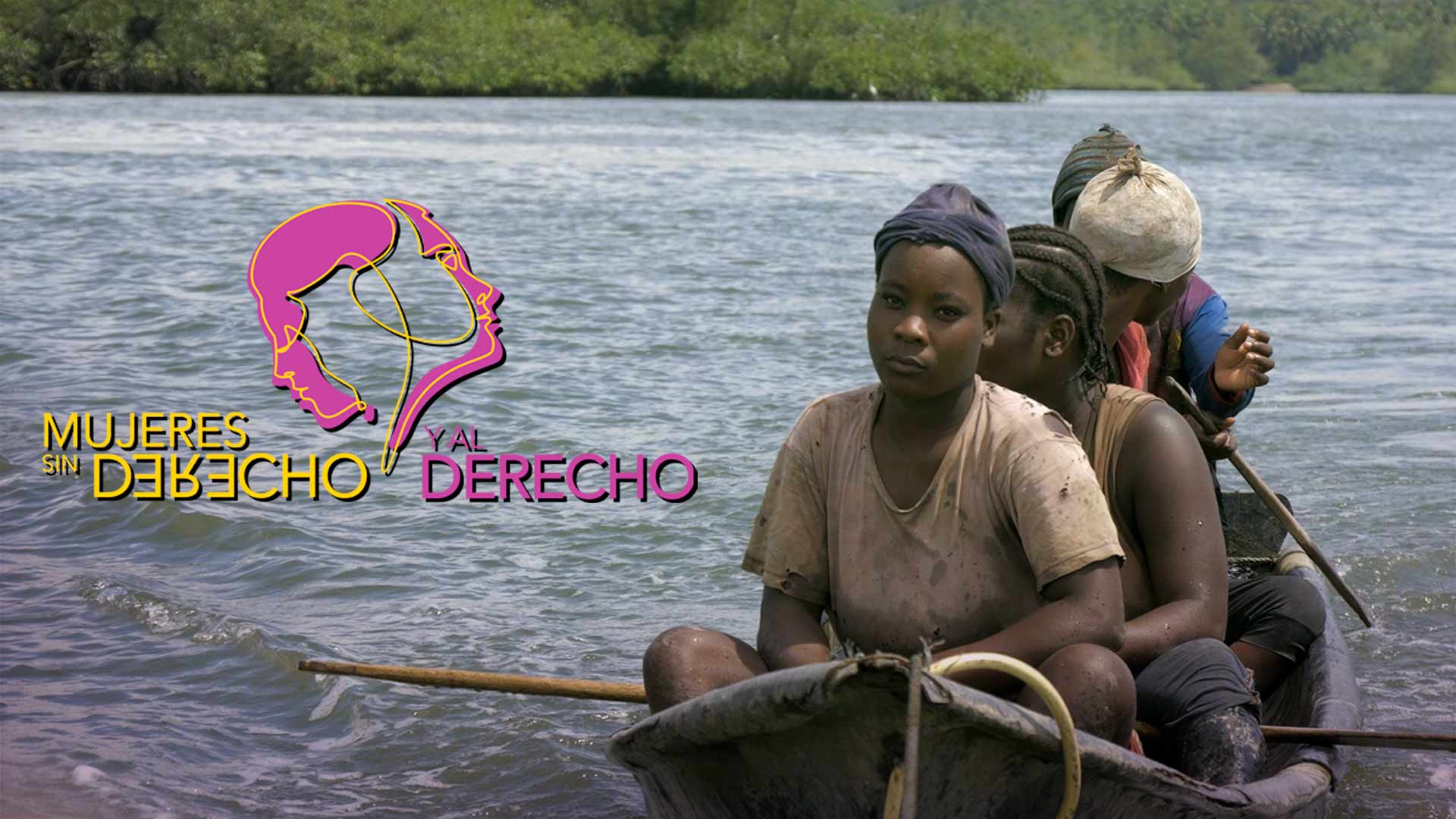 Mujeres afro navegando un rio en canoa